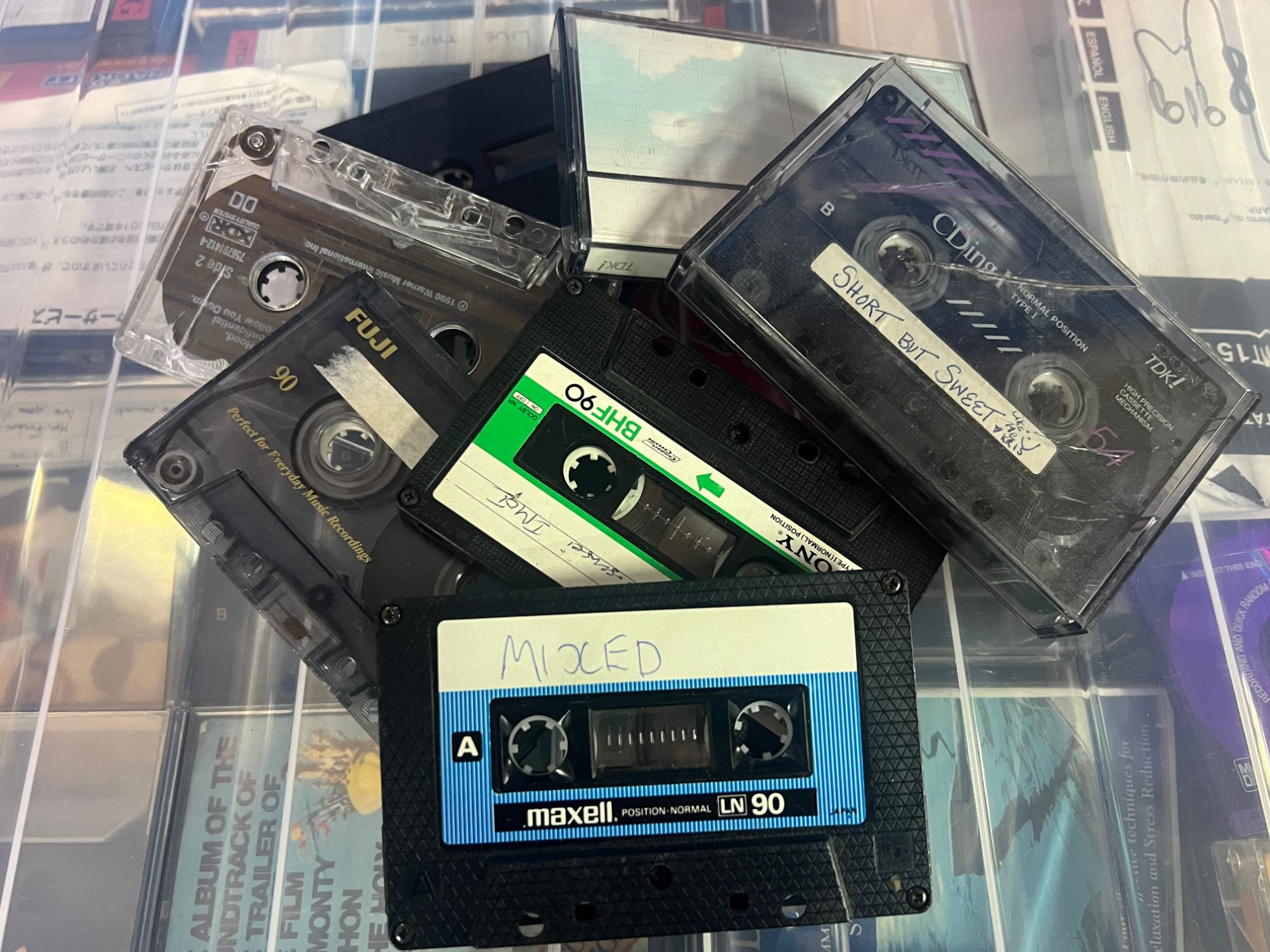 A collection of vintage audio cassette tapes ready to be digitised