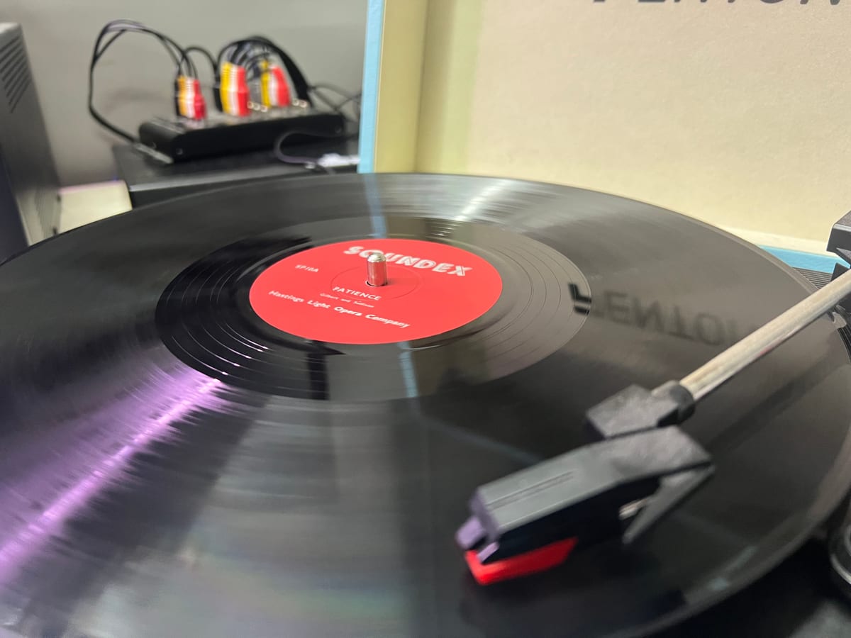 A vinyl record spinning on the turntable in the Sound Lounge studio, being digitised